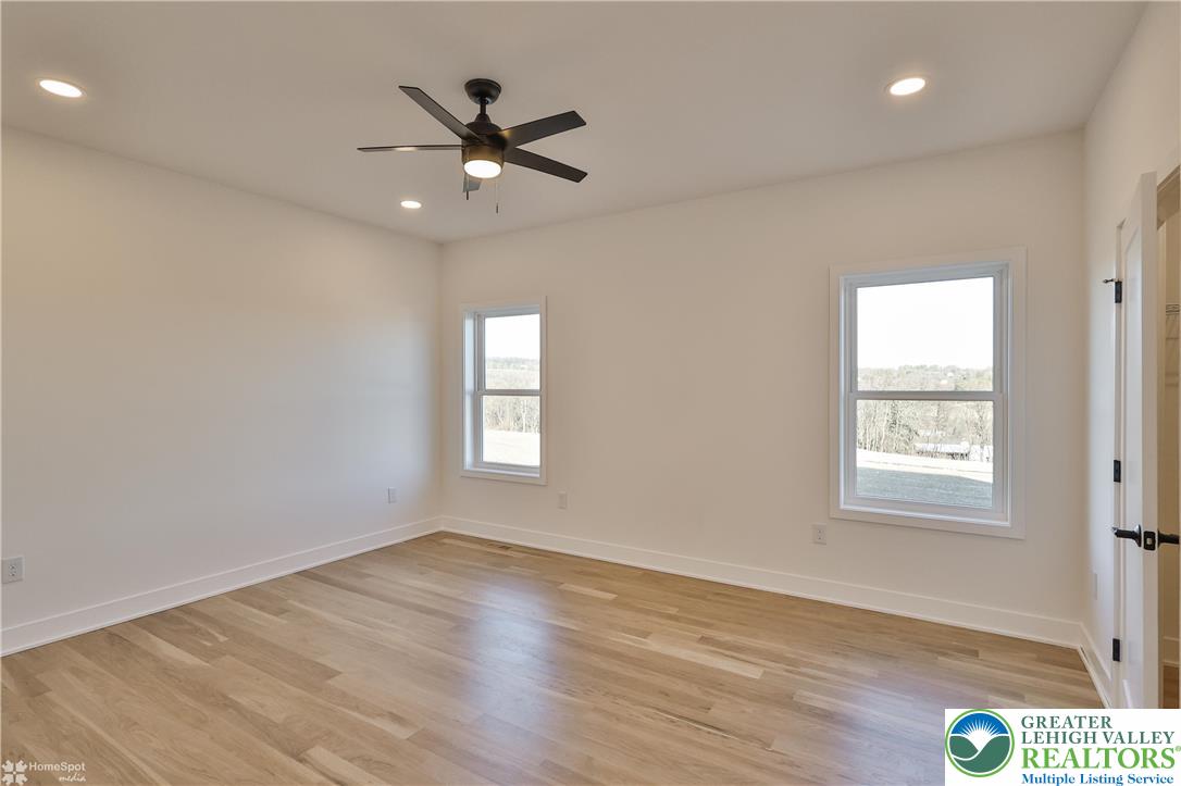 464 Long Lane Road Walnutport, PA 18088 - Photo 37 of 50 a view of an empty room with wooden floor and a window