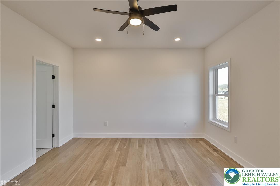 464 Long Lane Road Walnutport, PA 18088 - Photo 38 of 50 wooden floor in an empty room with a window