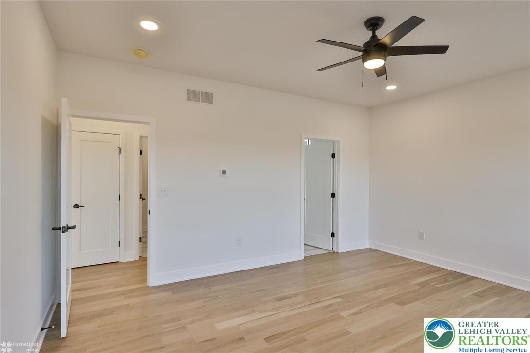 464 Long Lane Road Walnutport, PA 18088 - Photo 39 of 50 wooden floor in an empty room with a window