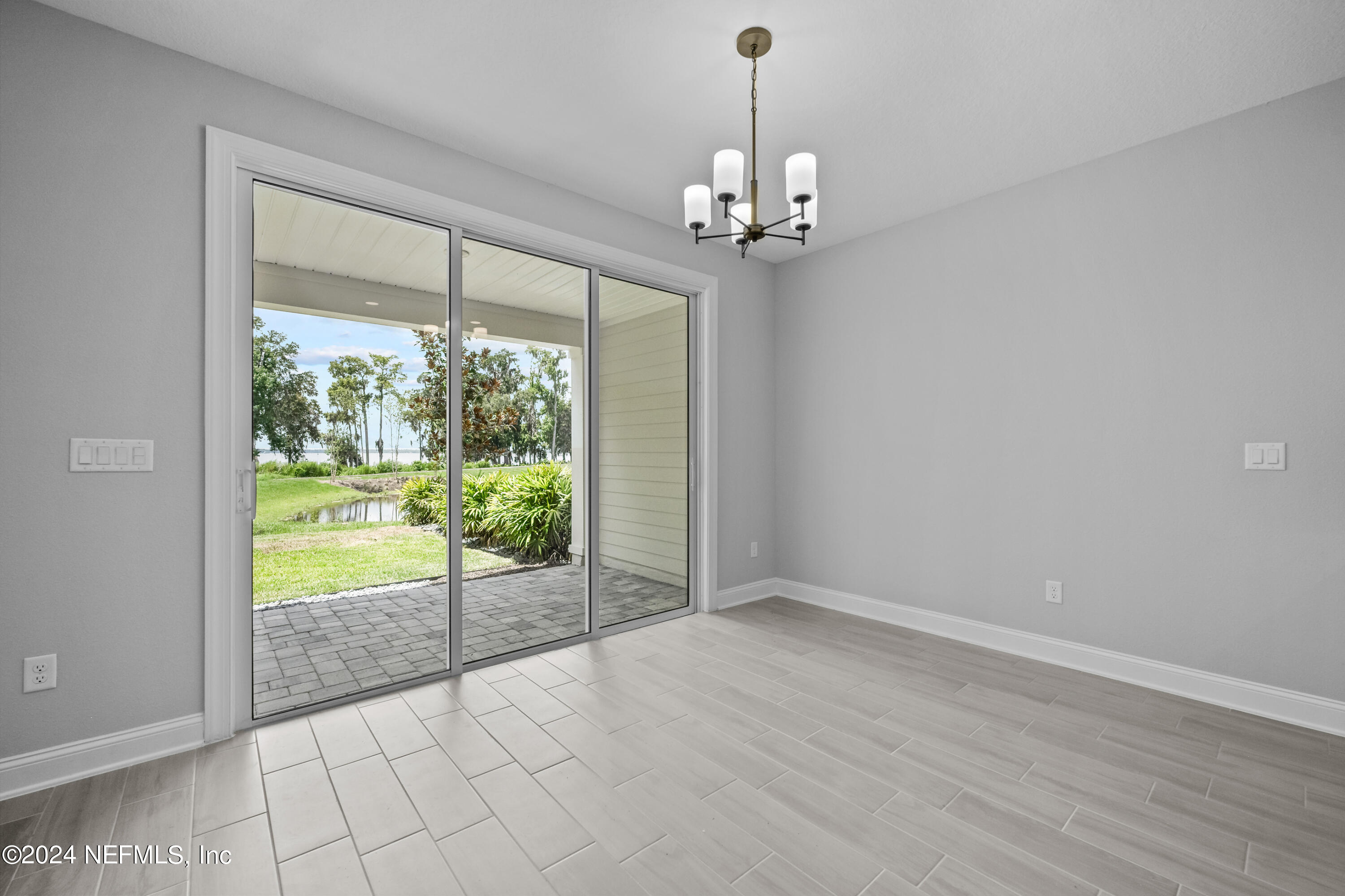 27 Oak Pk Drive St. Johns, FL 32259 - Photo 19 of 71 a view of an empty room with glass door