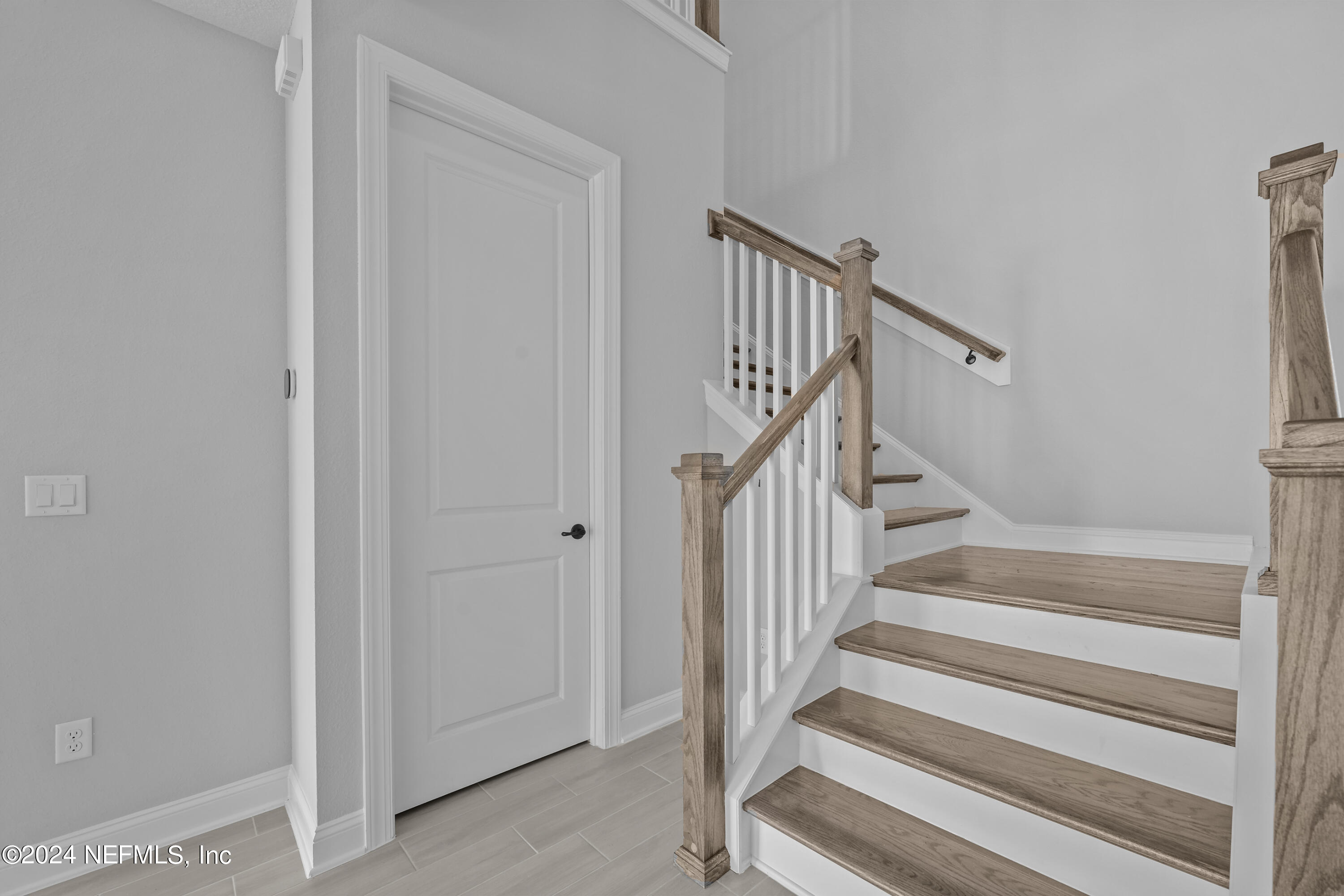 27 Oak Pk Drive St. Johns, FL 32259 - Photo 23 of 71 a view of staircase with white walls and white door
