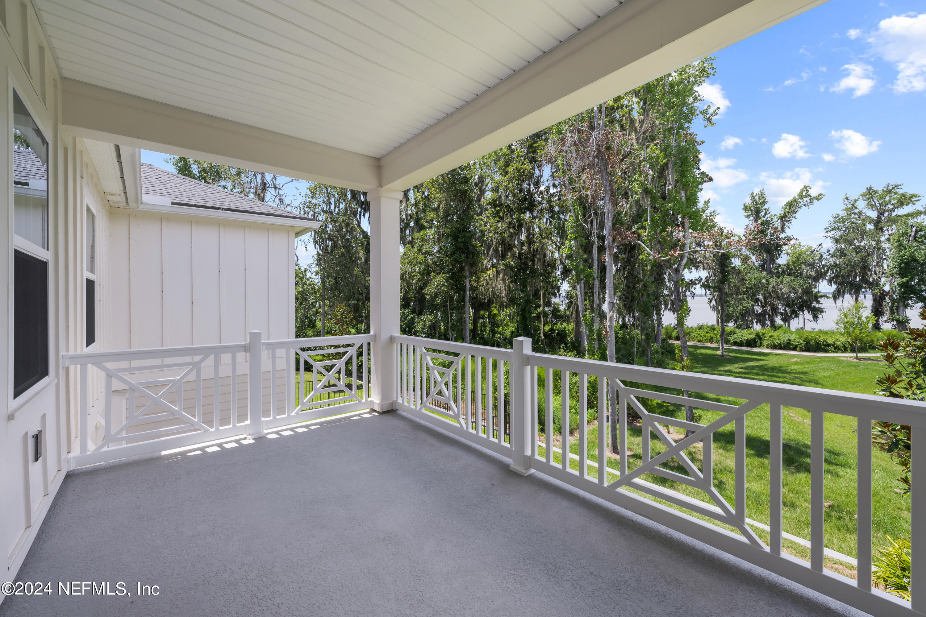 27 Oak Pk Drive St. Johns, FL 32259 - Photo 27 of 71 a view of a deck with couches with wooden floor and fence