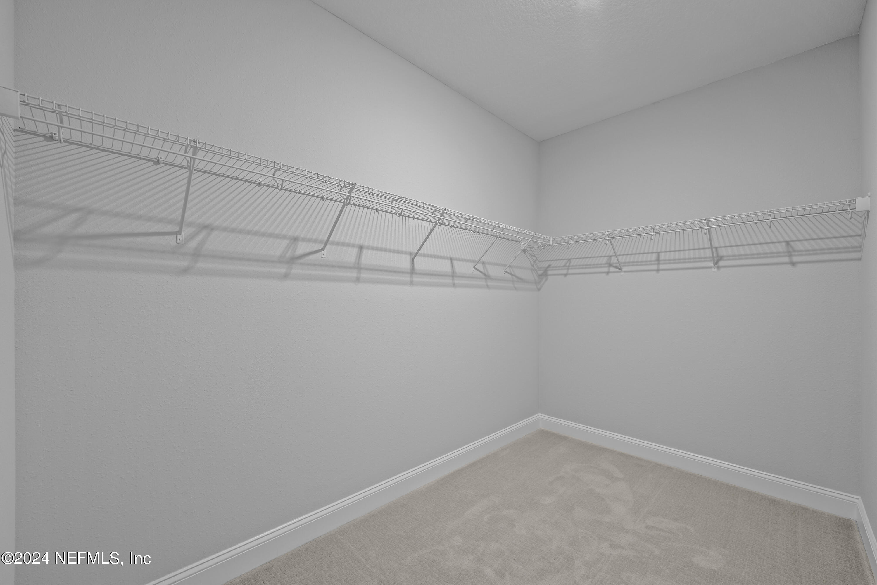 27 Oak Pk Drive St. Johns, FL 32259 - Photo 33 of 71 a view of a room with racks on the wall