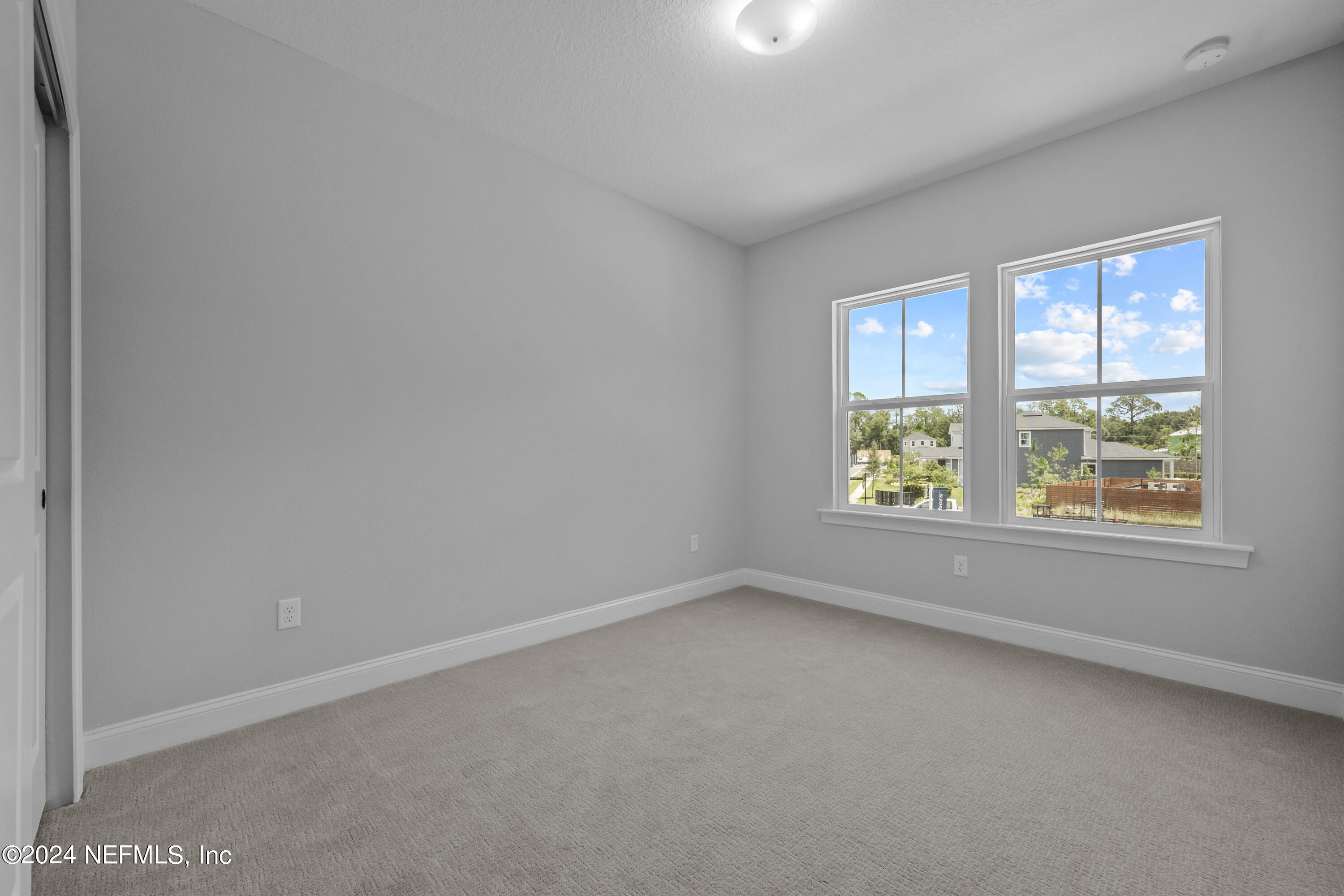 27 Oak Pk Drive St. Johns, FL 32259 - Photo 37 of 71 an empty room with a window