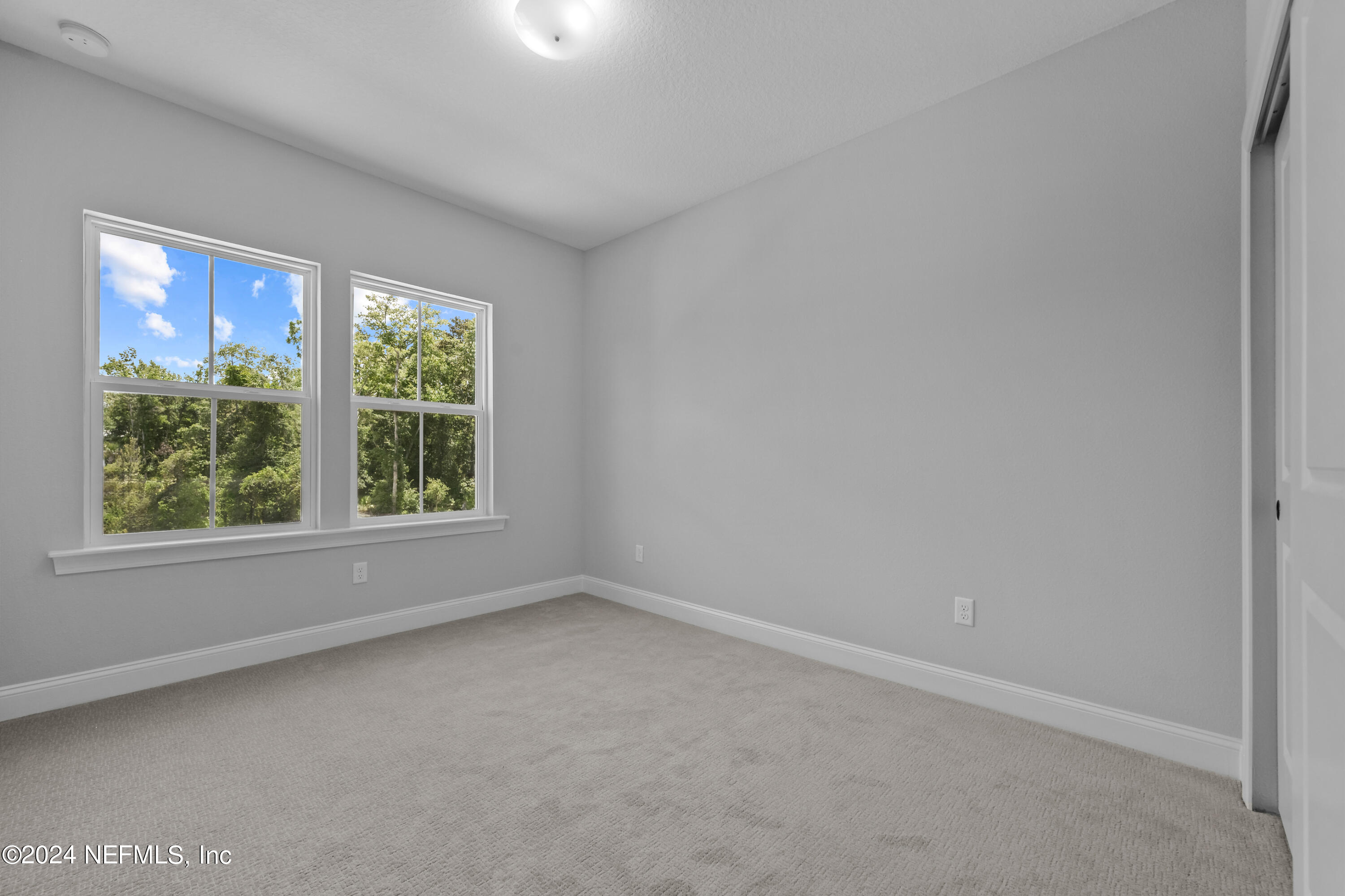 27 Oak Pk Drive St. Johns, FL 32259 - Photo 39 of 71 an empty room with windows