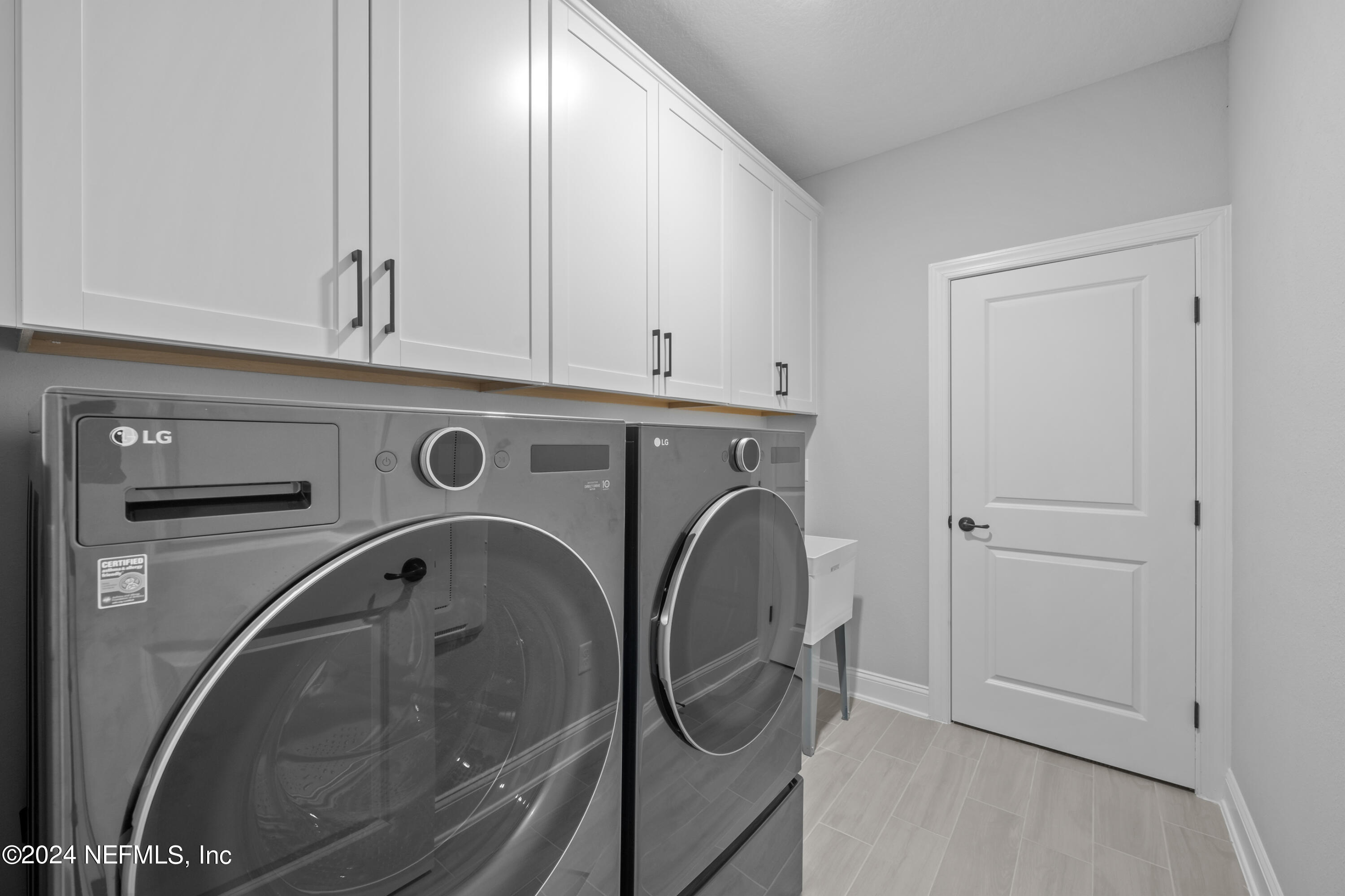 27 Oak Pk Drive St. Johns, FL 32259 - Photo 40 of 71 a utility room with dryer and washer