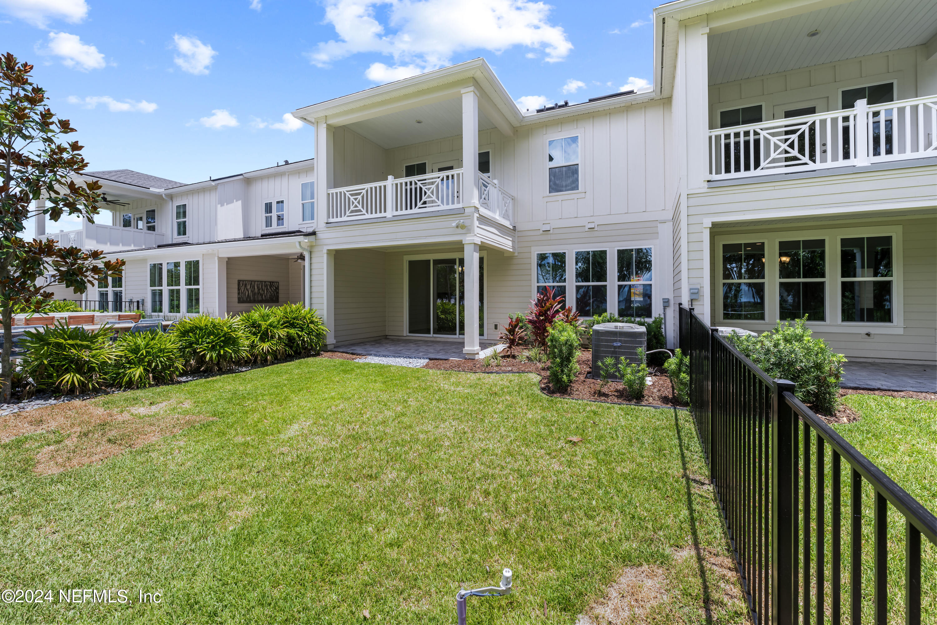 27 Oak Pk Drive St. Johns, FL 32259 - Photo 44 of 71 a view of a house with backyard porch and sitting area