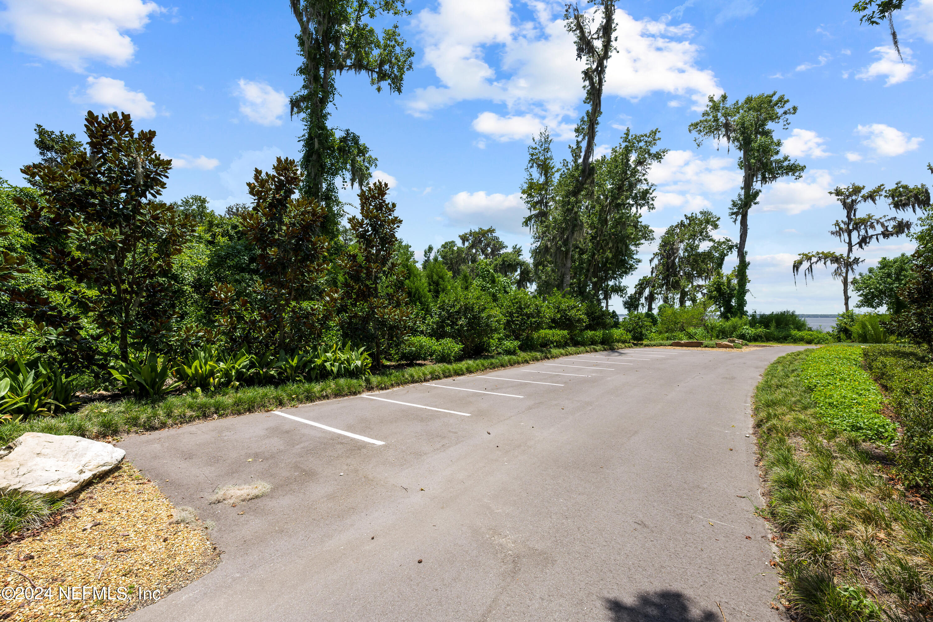 27 Oak Pk Drive St. Johns, FL 32259 - Photo 48 of 71 a view of a street with a flower garden