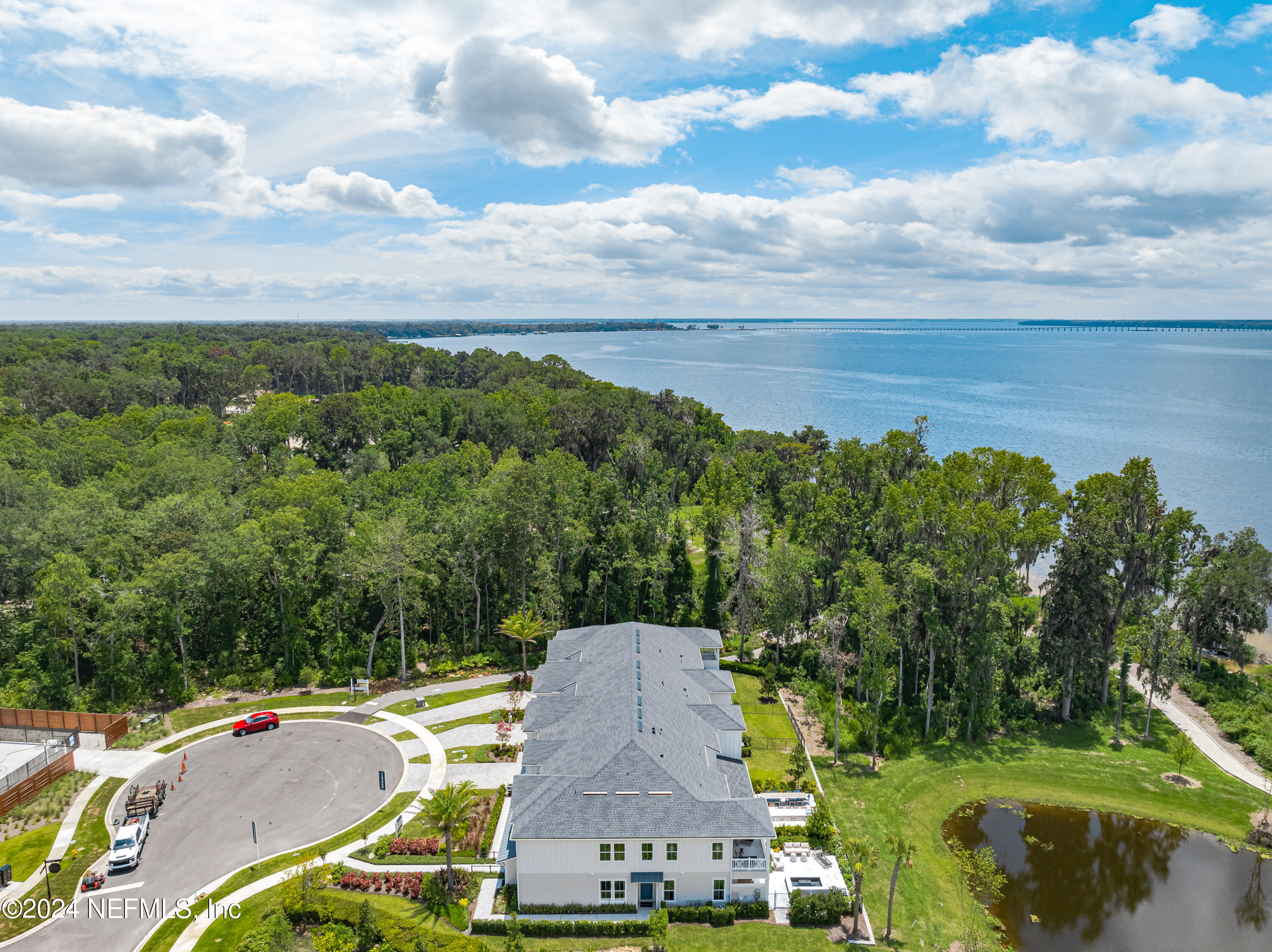 27 Oak Pk Drive St. Johns, FL 32259 - Photo 53 of 71 aerial view of a house with a garden and lake view