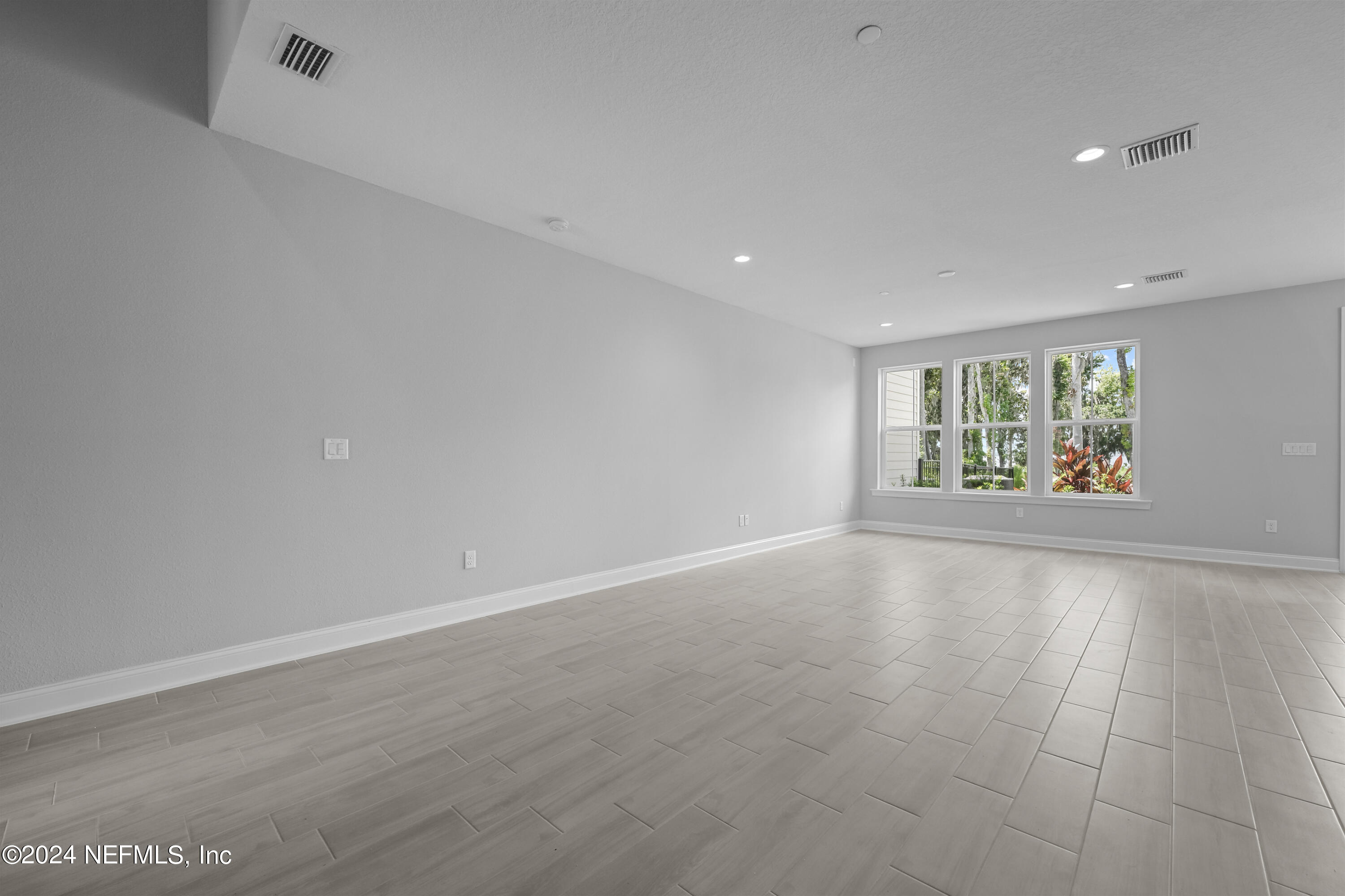 27 Oak Pk Drive St. Johns, FL 32259 - Photo 10 of 71 an empty room with windows