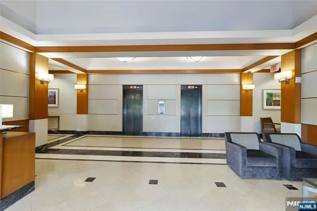 a view of living room with granite countertop and couch