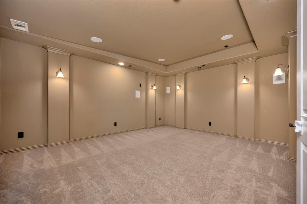 1052 Highpoint Way Roanoke, TX 76262 - Photo 20 of 24 Media room with surround sound speakers