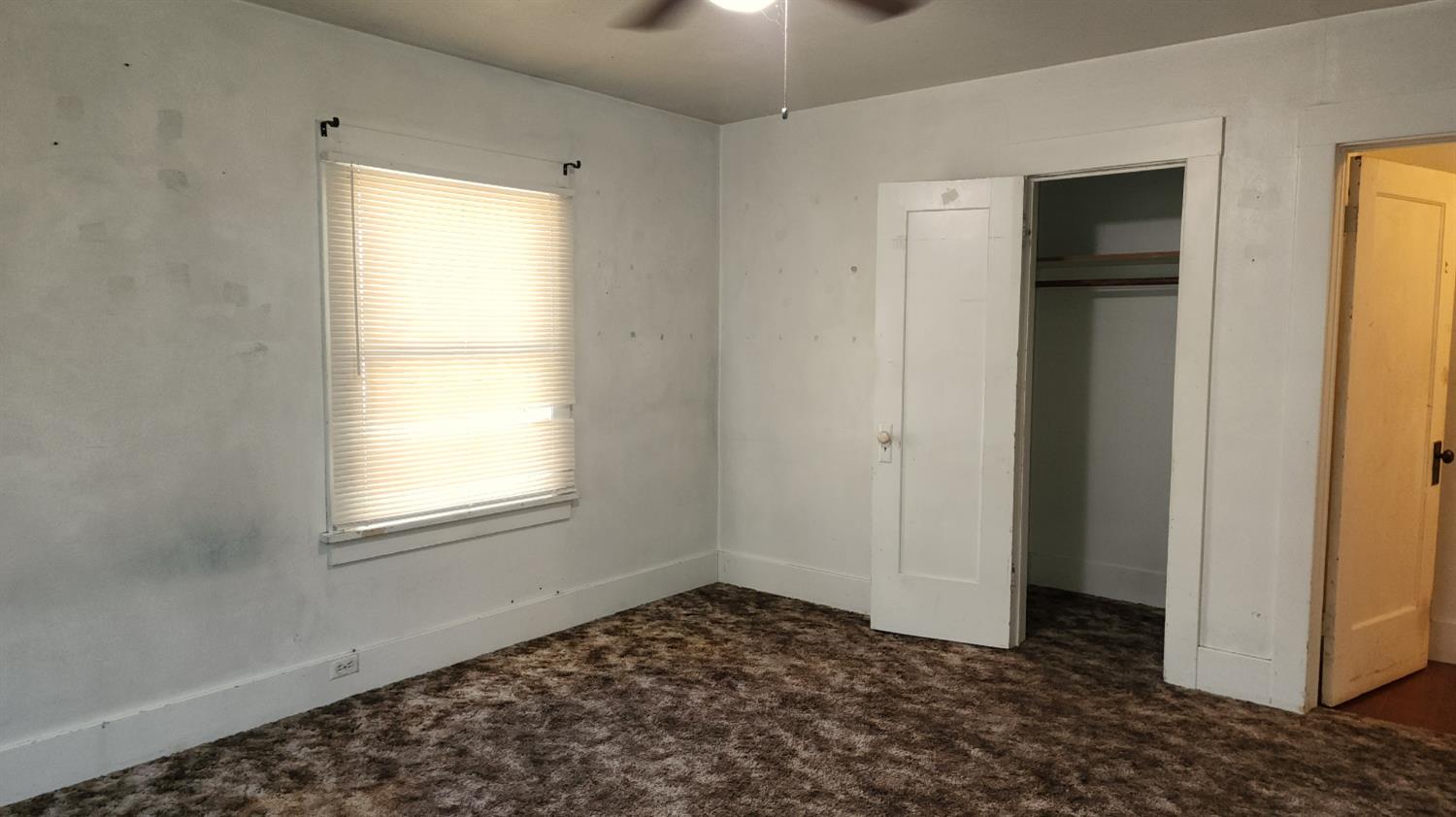406 2nd Street Arbuckle, CA 95912 - Photo 18 of 31 a view of an empty room with window and closet area