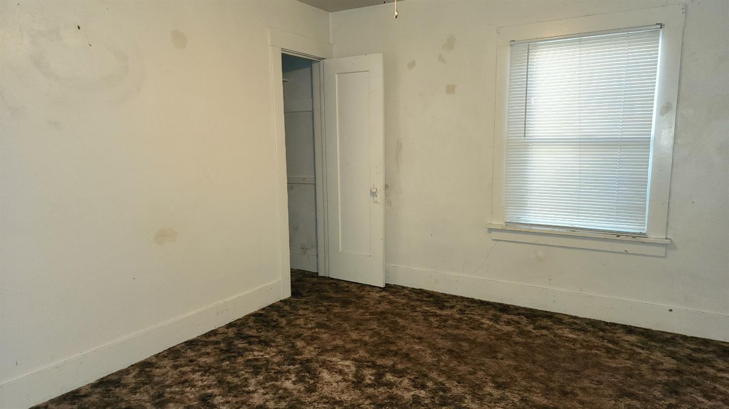406 2nd Street Arbuckle, CA 95912 - Photo 21 of 31 a view of a small space with wooden floor and a window