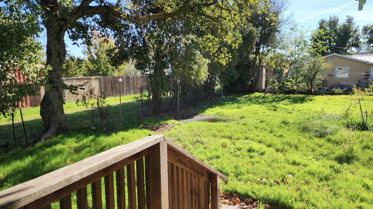 406 2nd Street Arbuckle, CA 95912 - Photo 29 of 31 a balcony with trees in front of it