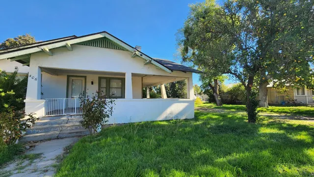 front view of house with a yard
