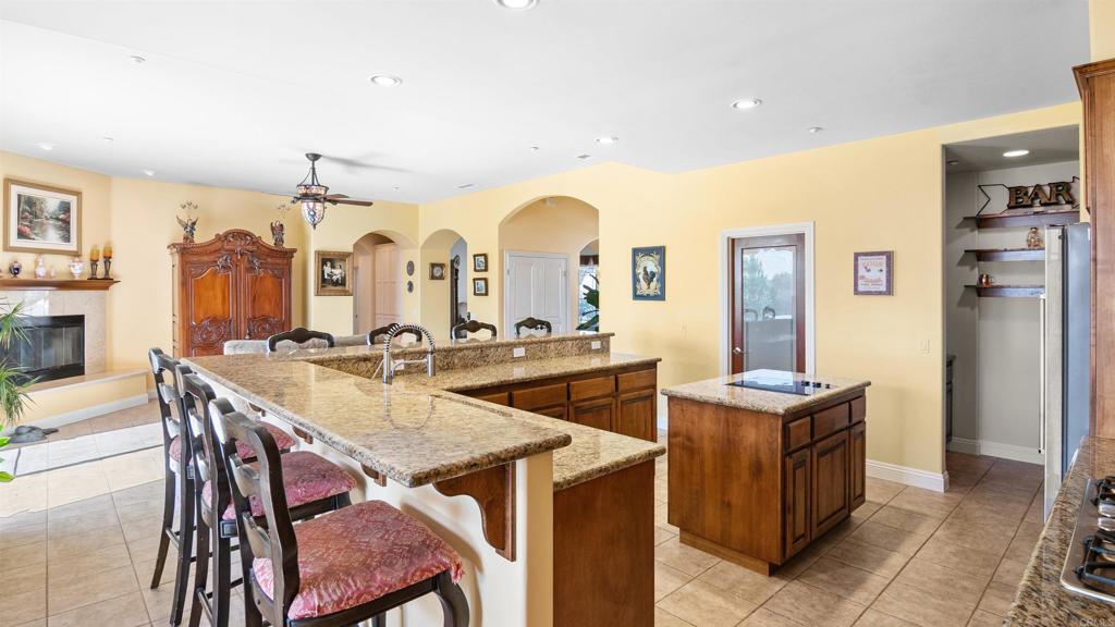 40487 Rock Mountain Drive Fallbrook, CA 92028 - Photo 17 of 57 a view of a kitchen and dining room