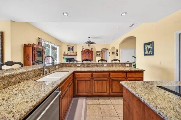 a large bathroom with a sink and a mirror