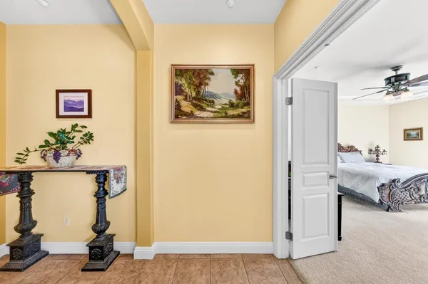 a bedroom with a bed and a couch