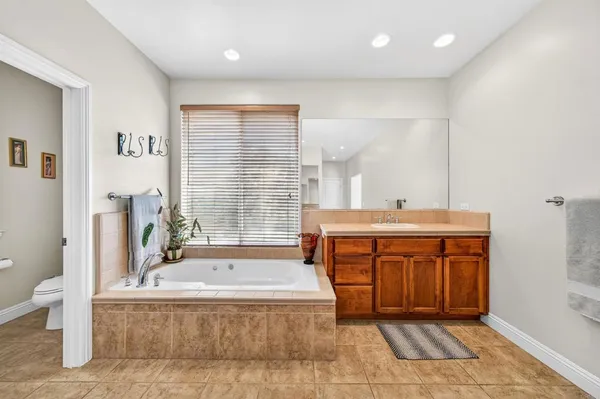 a bed room with a bed and a window