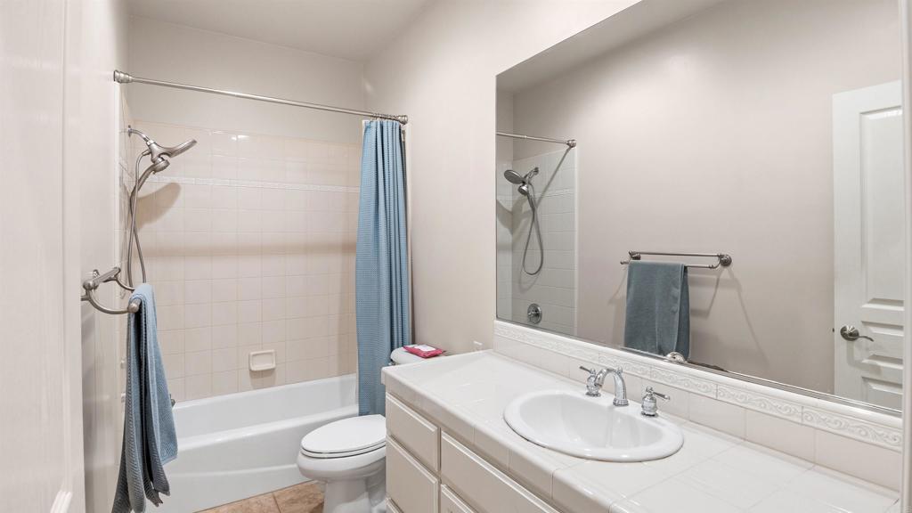40487 Rock Mountain Drive Fallbrook, CA 92028 - Photo 37 of 57 a bathroom with a sink toilet and shower