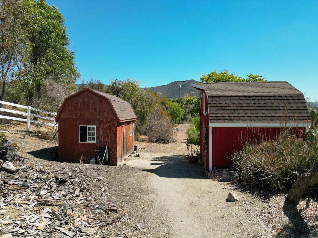 40487 Rock Mountain Drive Fallbrook, CA 92028 - Photo 49 of 57 a view of a house with a yard