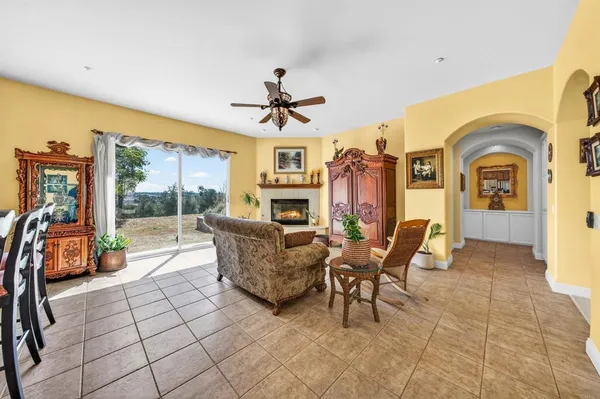 a kitchen with stainless steel appliances granite countertop a stove top oven and cabinets