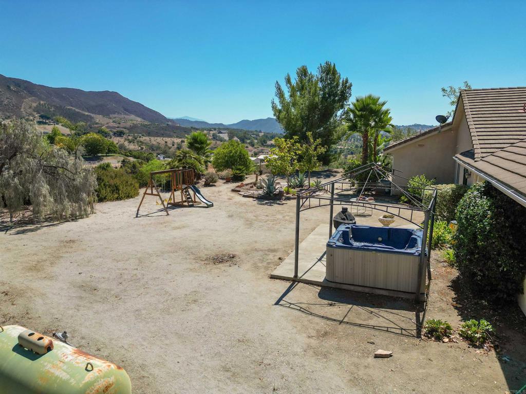 40487 Rock Mountain Drive Fallbrook, CA 92028 - Photo 51 of 57 a view of a backyard with sitting area