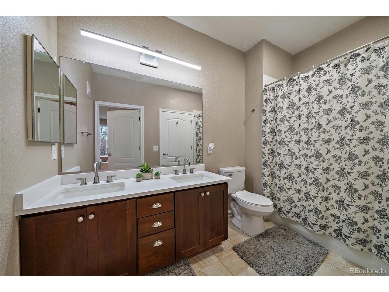 18611 Stroh Road, Unit 102 Parker, CO 80134 - Photo 16 of 23 2nd full bath with quartz countertops