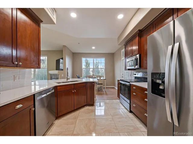a view of a door and wooden floor