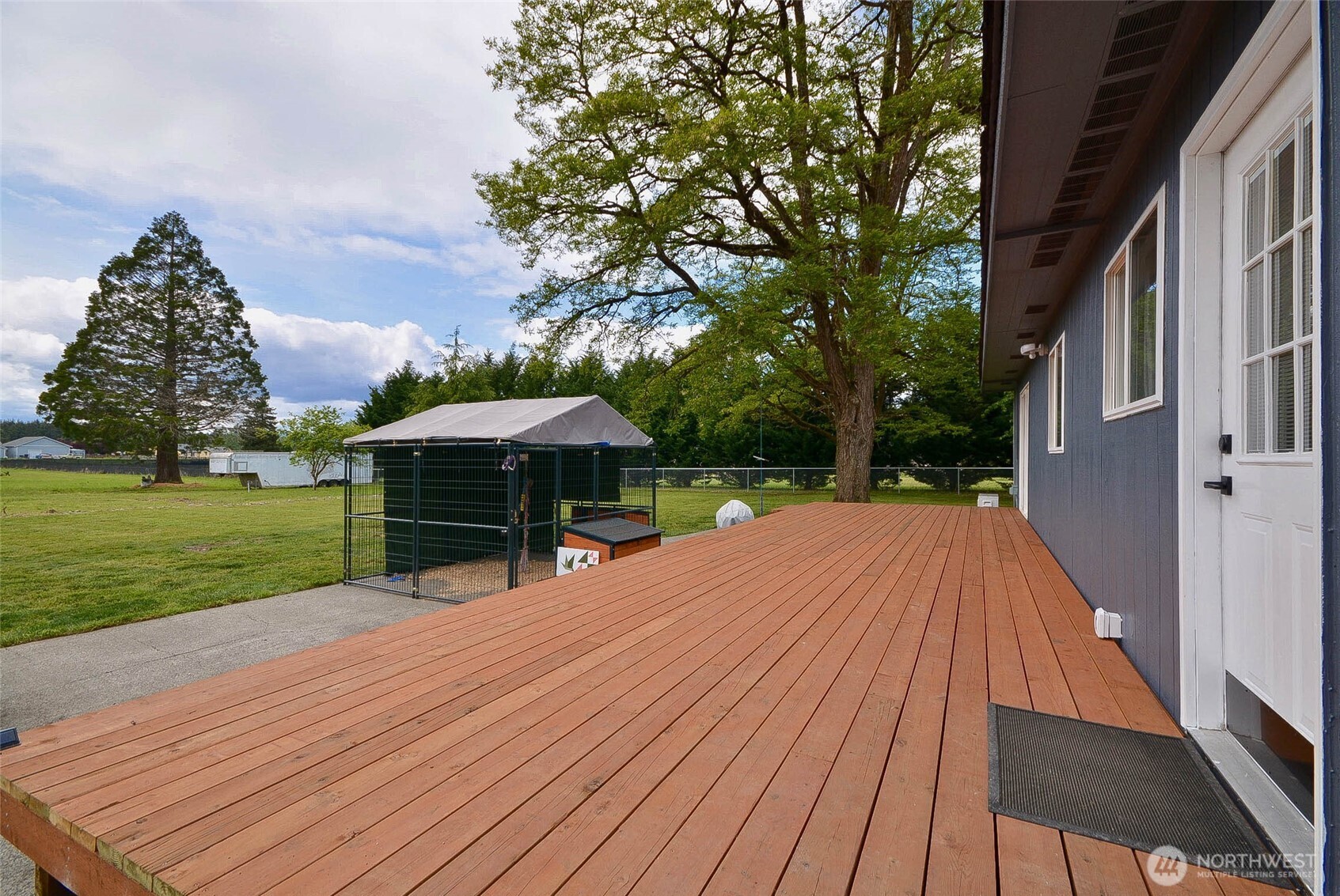20005 Carper Road Southwest Rochester, WA 98579 - Photo 14 of 35 a view of a backyard with wooden floor