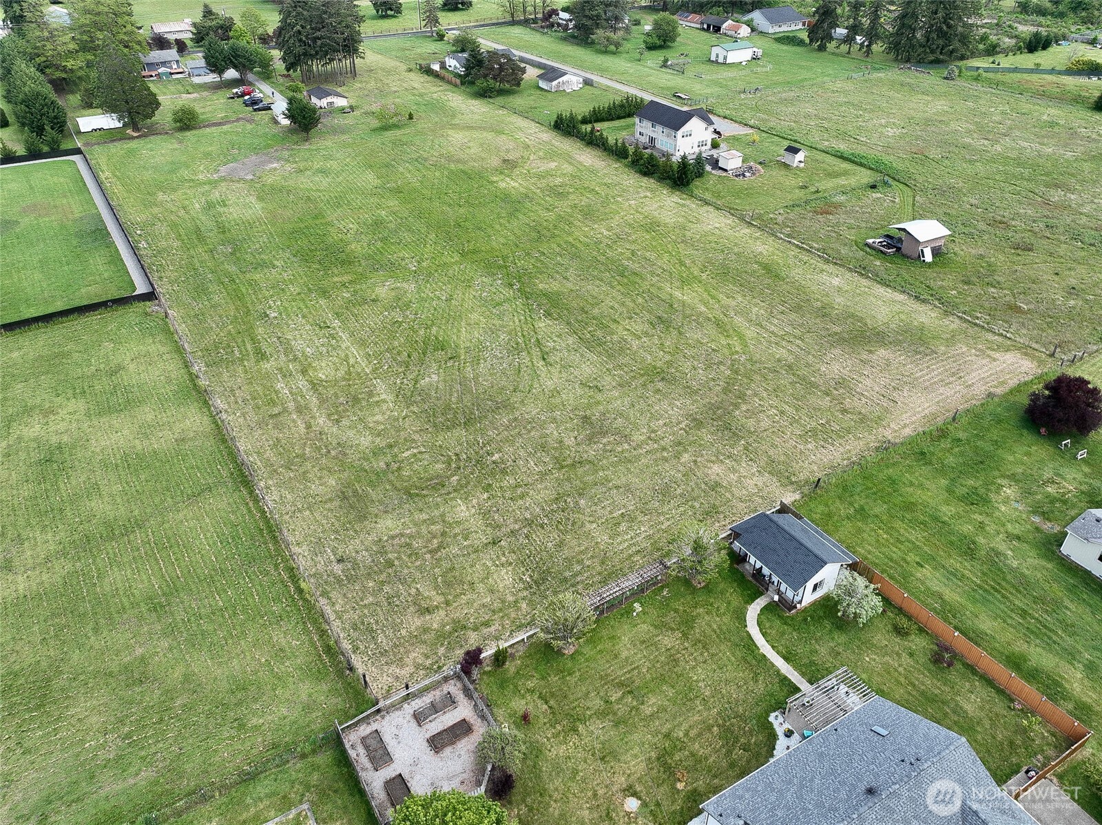 20005 Carper Road Southwest Rochester, WA 98579 - Photo 2 of 35 a backyard of a house with lots of green space