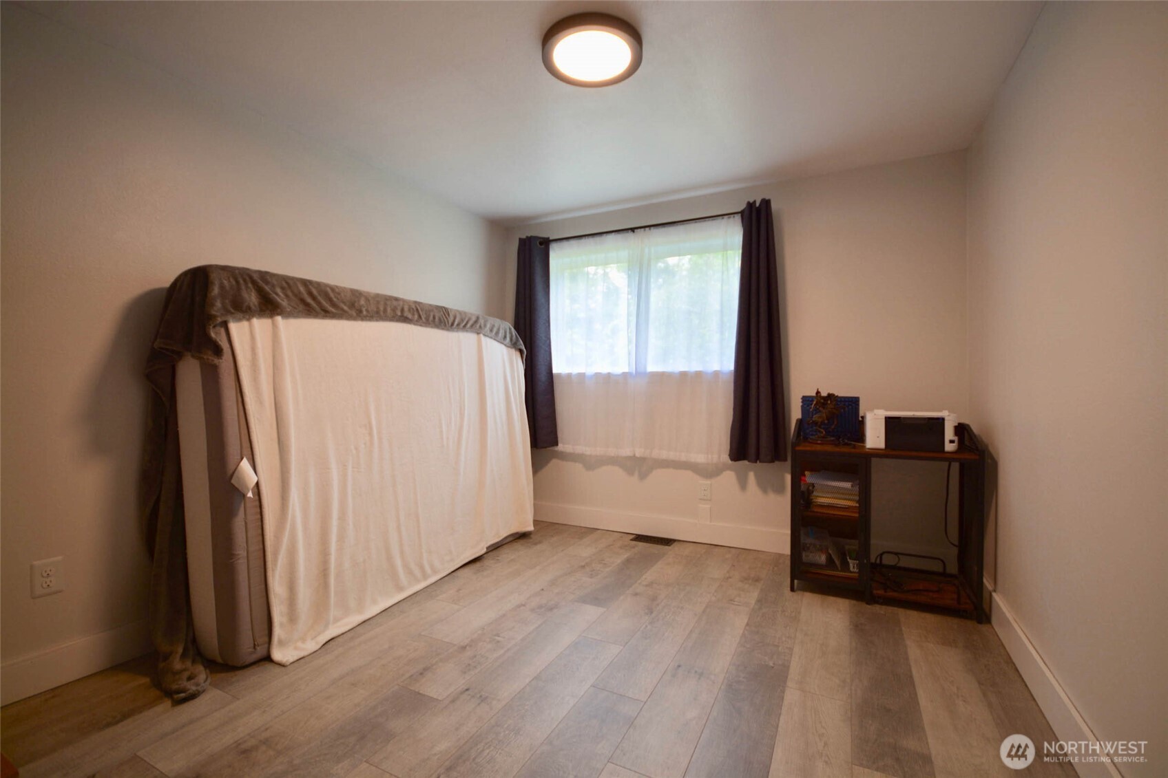 20005 Carper Road Southwest Rochester, WA 98579 - Photo 27 of 35 a view of a livingroom with furniture and a window