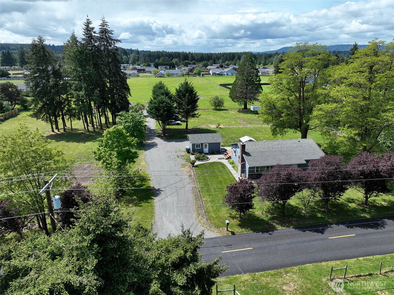 20005 Carper Road Southwest Rochester, WA 98579 - Photo 3 of 35 an aerial view of a house with a yard