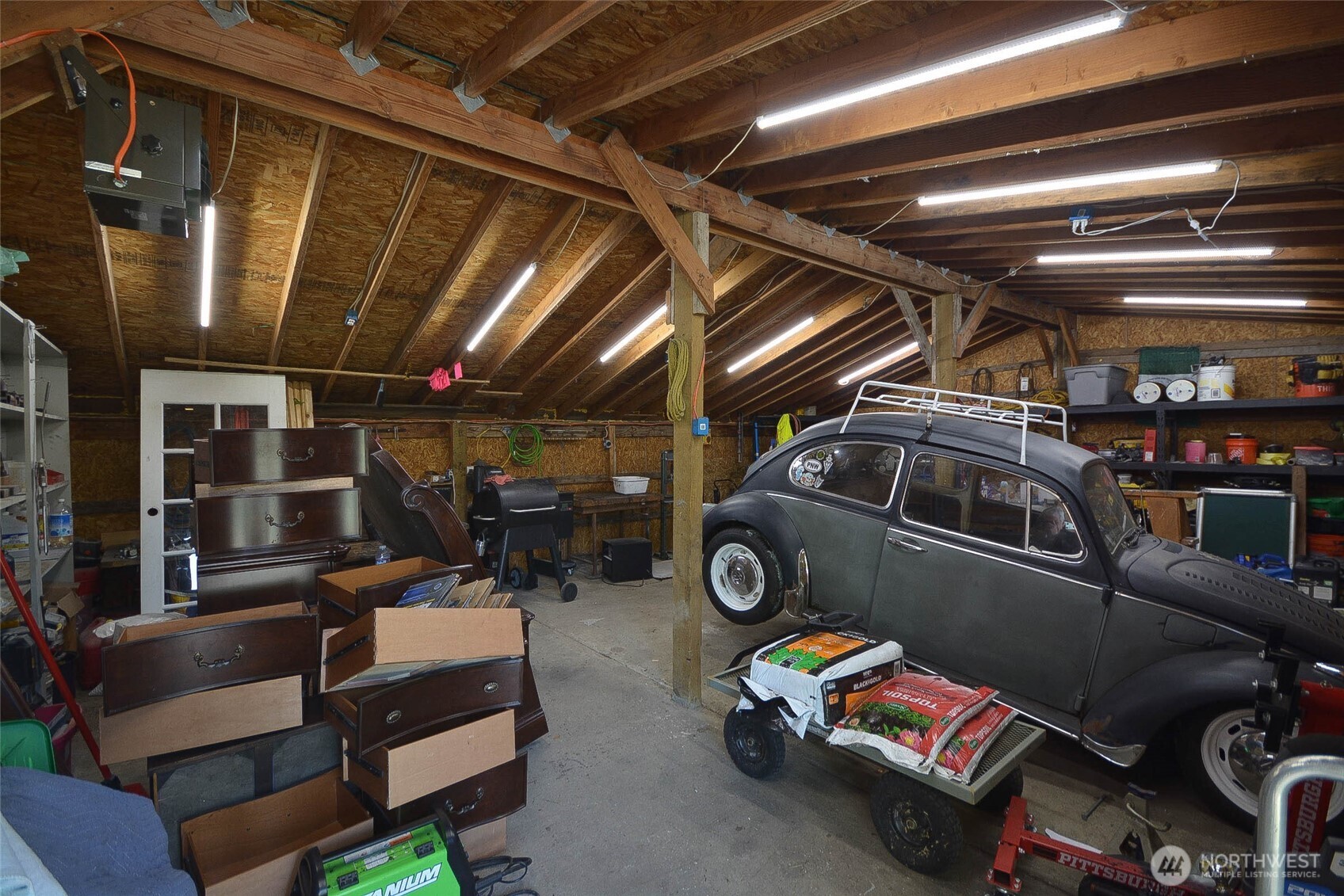20005 Carper Road Southwest Rochester, WA 98579 - Photo 35 of 35 a car parked in a garage
