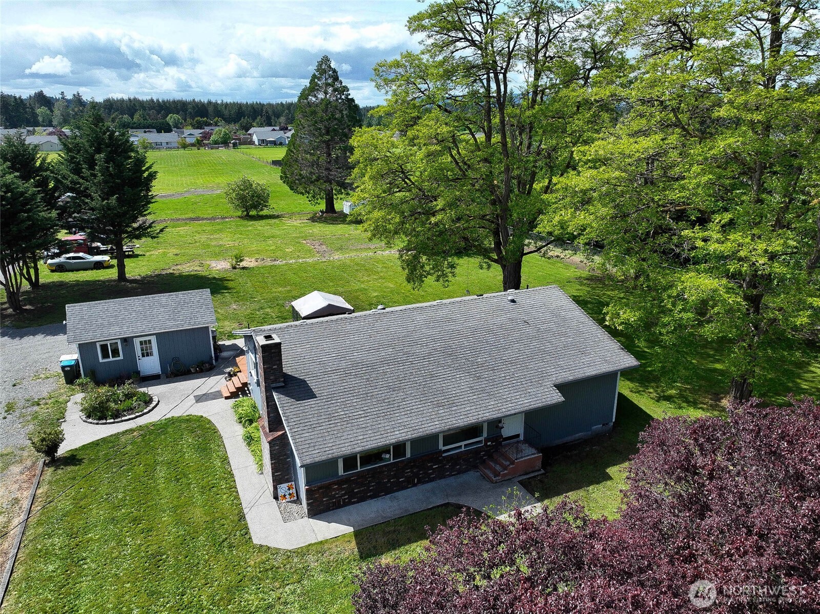 20005 Carper Road Southwest Rochester, WA 98579 - Photo 5 of 35 an aerial view of a house with big yard
