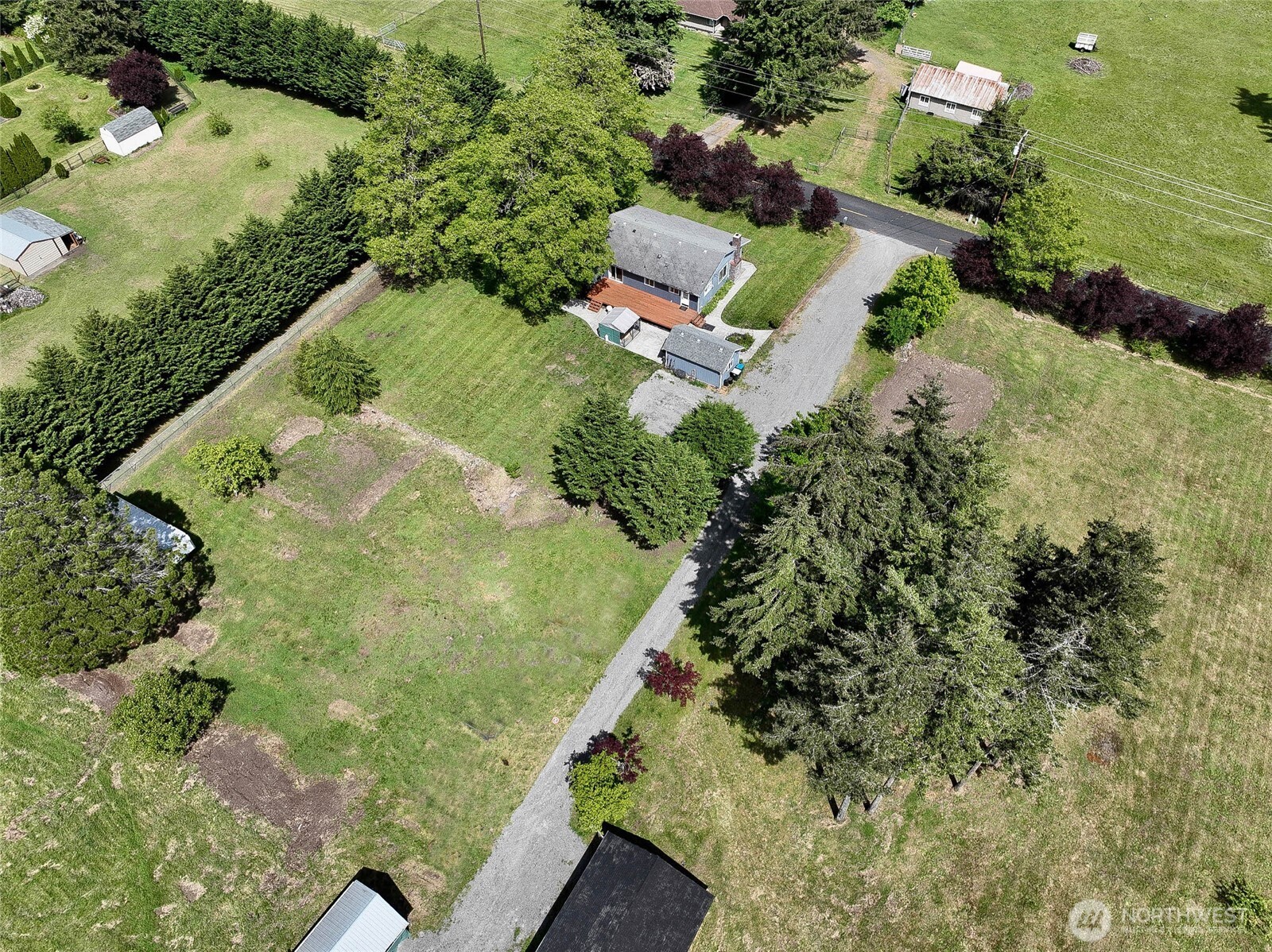 20005 Carper Road Southwest Rochester, WA 98579 - Photo 6 of 35 an aerial view of a house with a yard