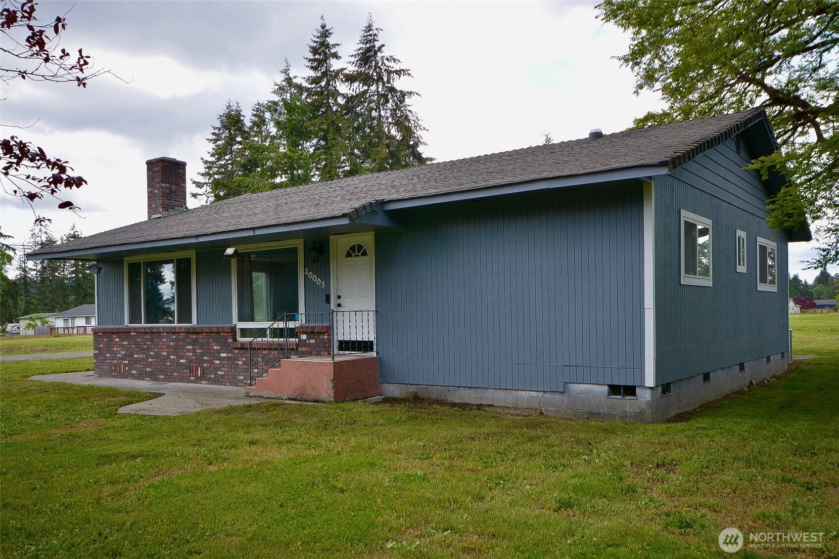 20005 Carper Road Southwest Rochester, WA 98579 - Photo 7 of 35 a view of an house with backyard space and garden