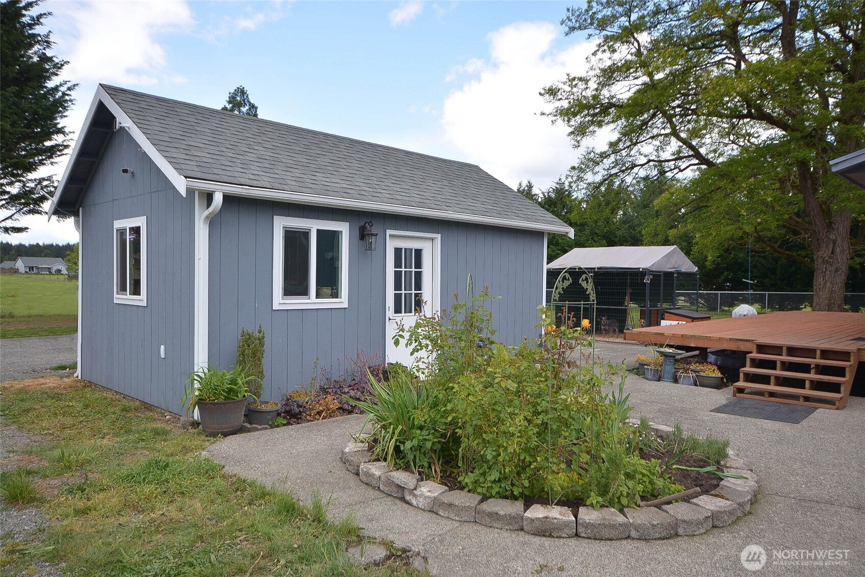 20005 Carper Road Southwest Rochester, WA 98579 - Photo 8 of 35 a front view of a house with a yard