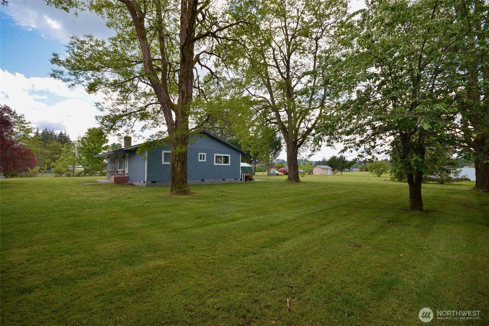 20005 Carper Road Southwest Rochester, WA 98579 - Photo 9 of 35 a front view of a house with garden