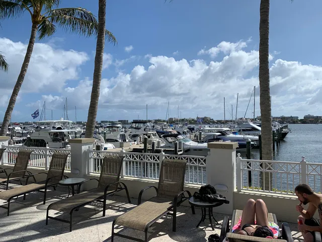 a view of a balcony with chairs