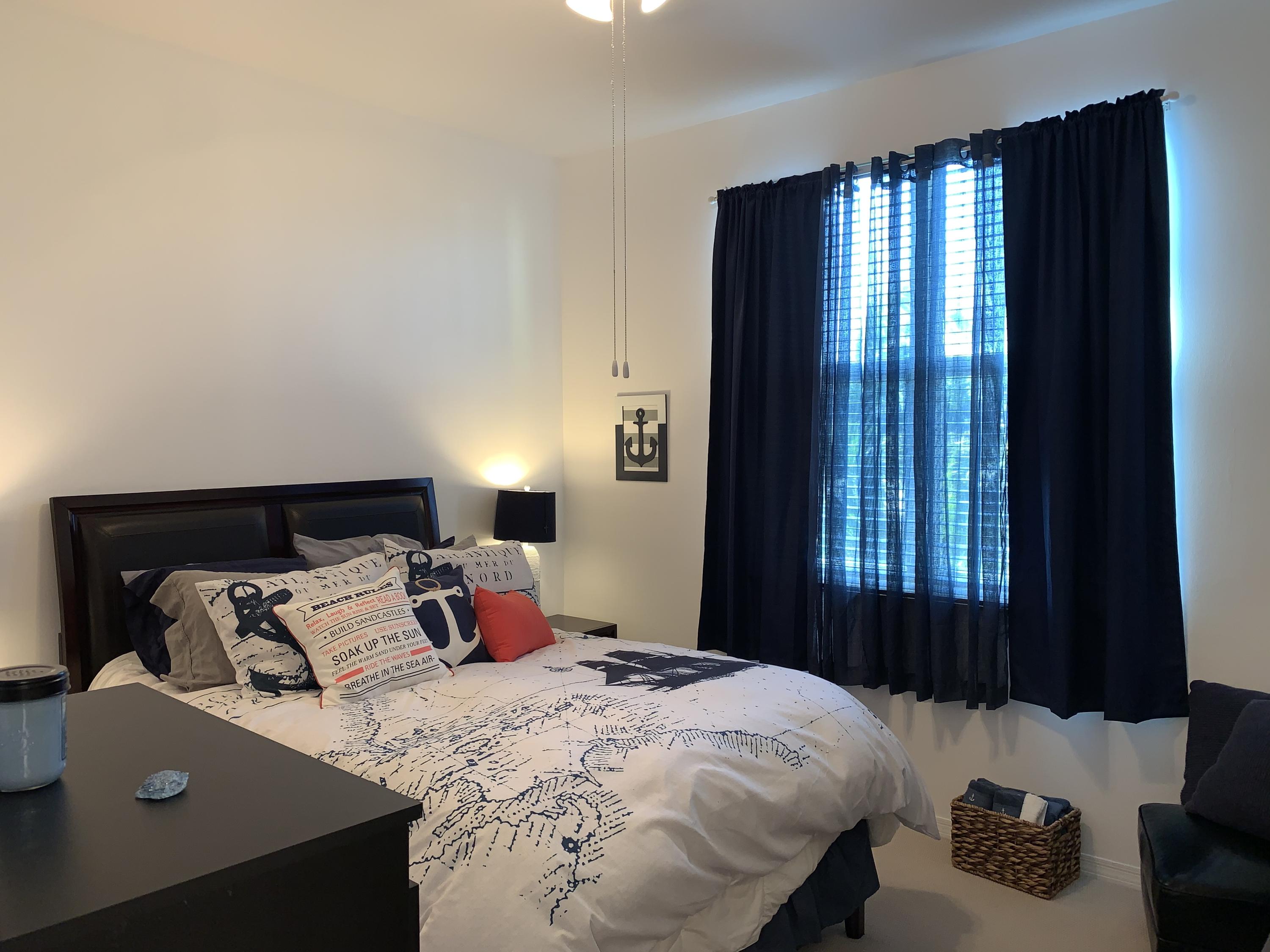 802 West Windward Way, Unit PH15 Lantana, FL 33462 - Photo 31 of 34 a bedroom with bed and window