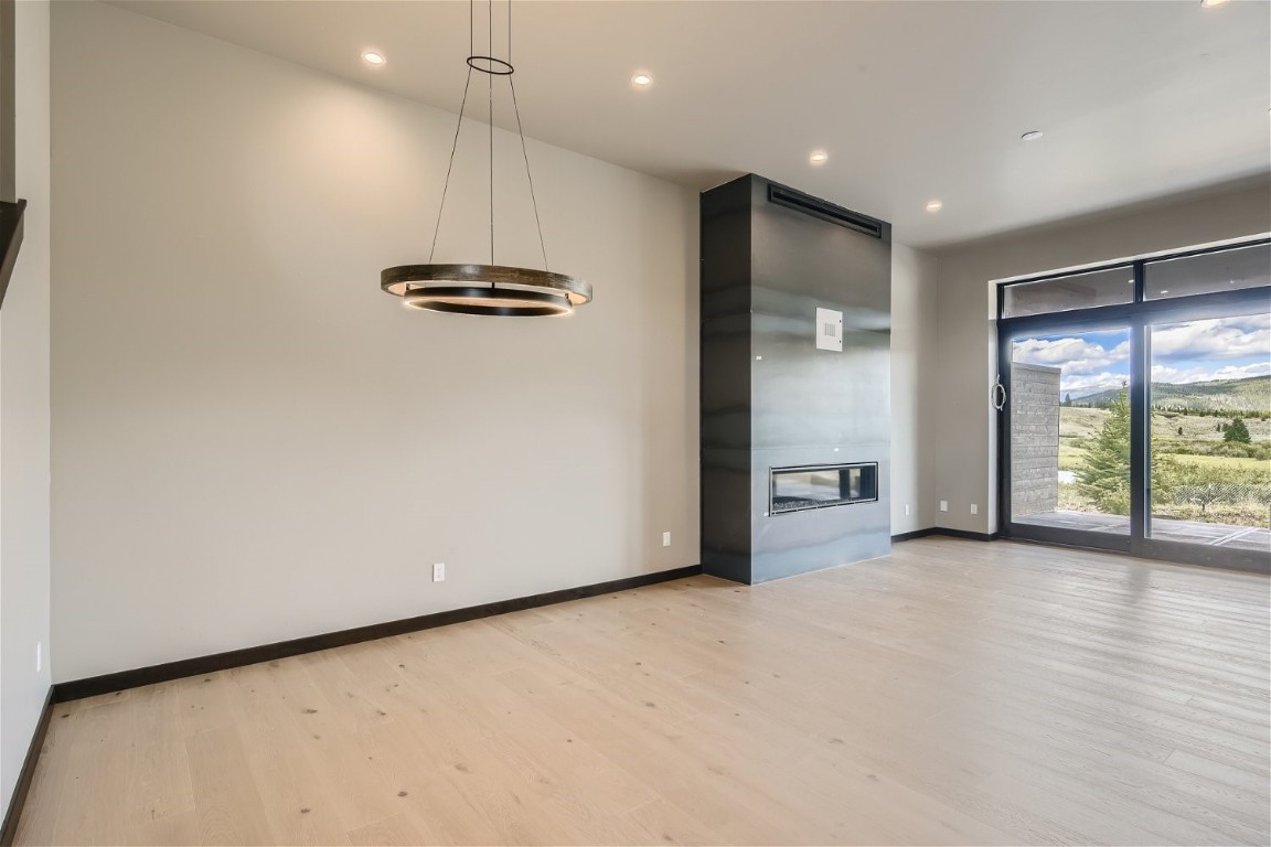 280 Monitor Drive Breckenridge, CO 80424 - Photo 12 of 50 Fireplace and Dining Room in recently completed home