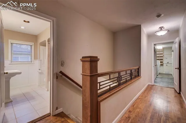 a view of an empty room with closet