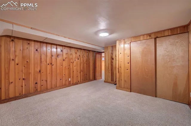 a bathroom with a sink a toilet a mirror and shower curtain