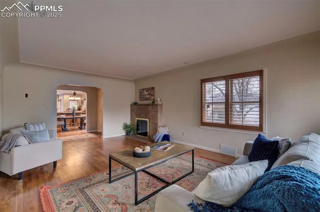 a living room with furniture and a window