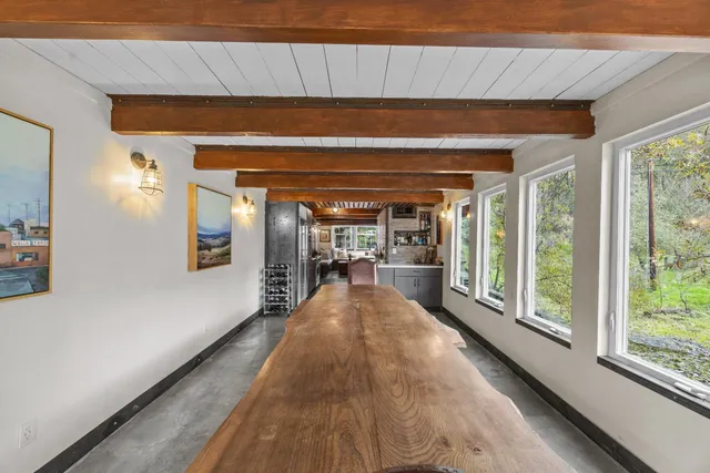 a view of livingroom with furniture and window