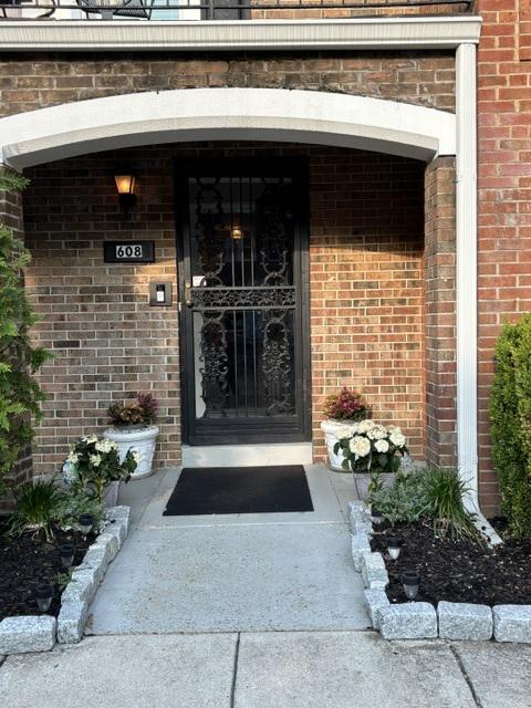 608 6th Place Southwest Washington, DC 20024 - Photo 3 of 65 Inviting entrance with lush greenery and flowers.