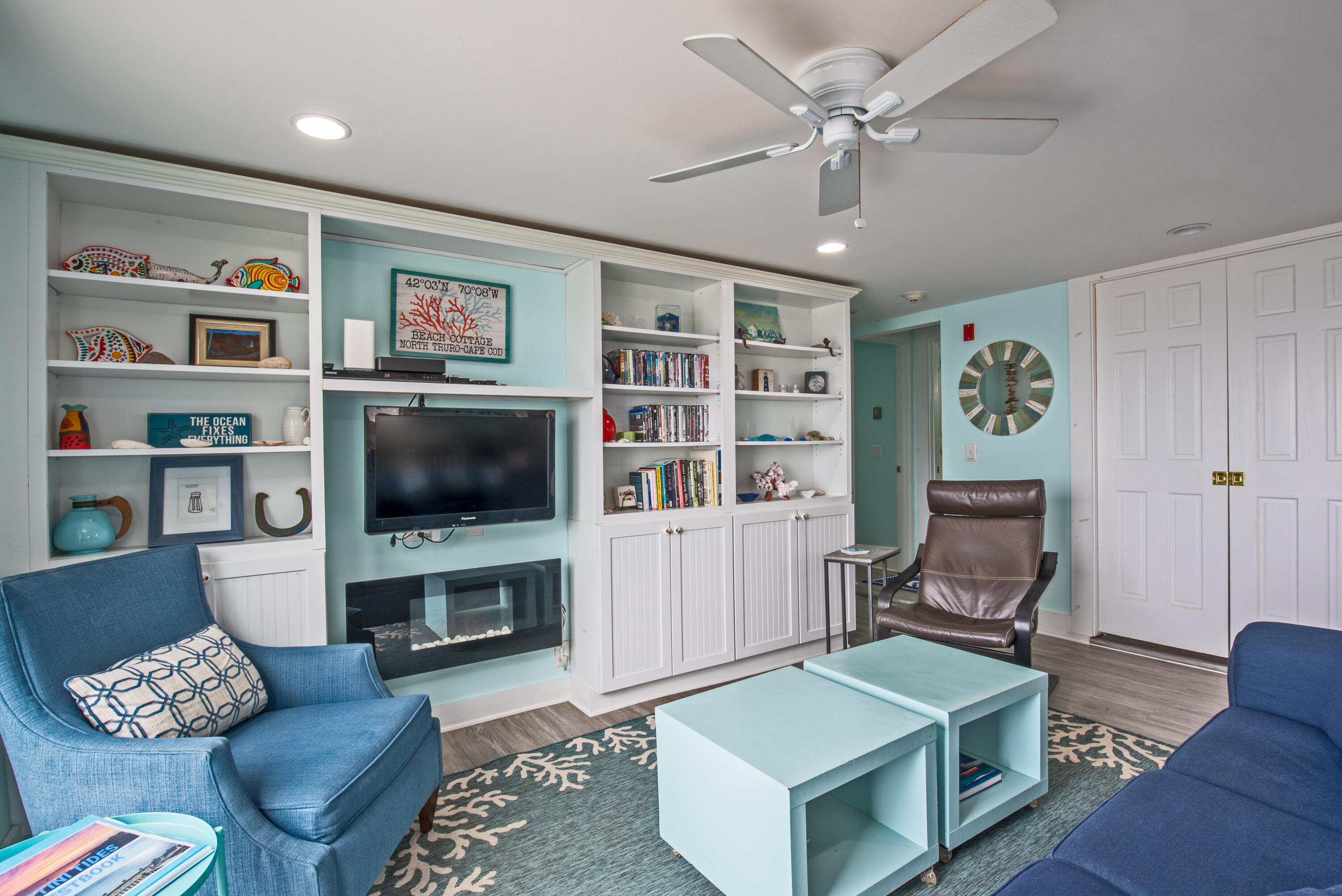 522 Shore Road, Unit 5 Truro, MA 02666 - Photo 18 of 28 a living room with furniture and a flat screen tv