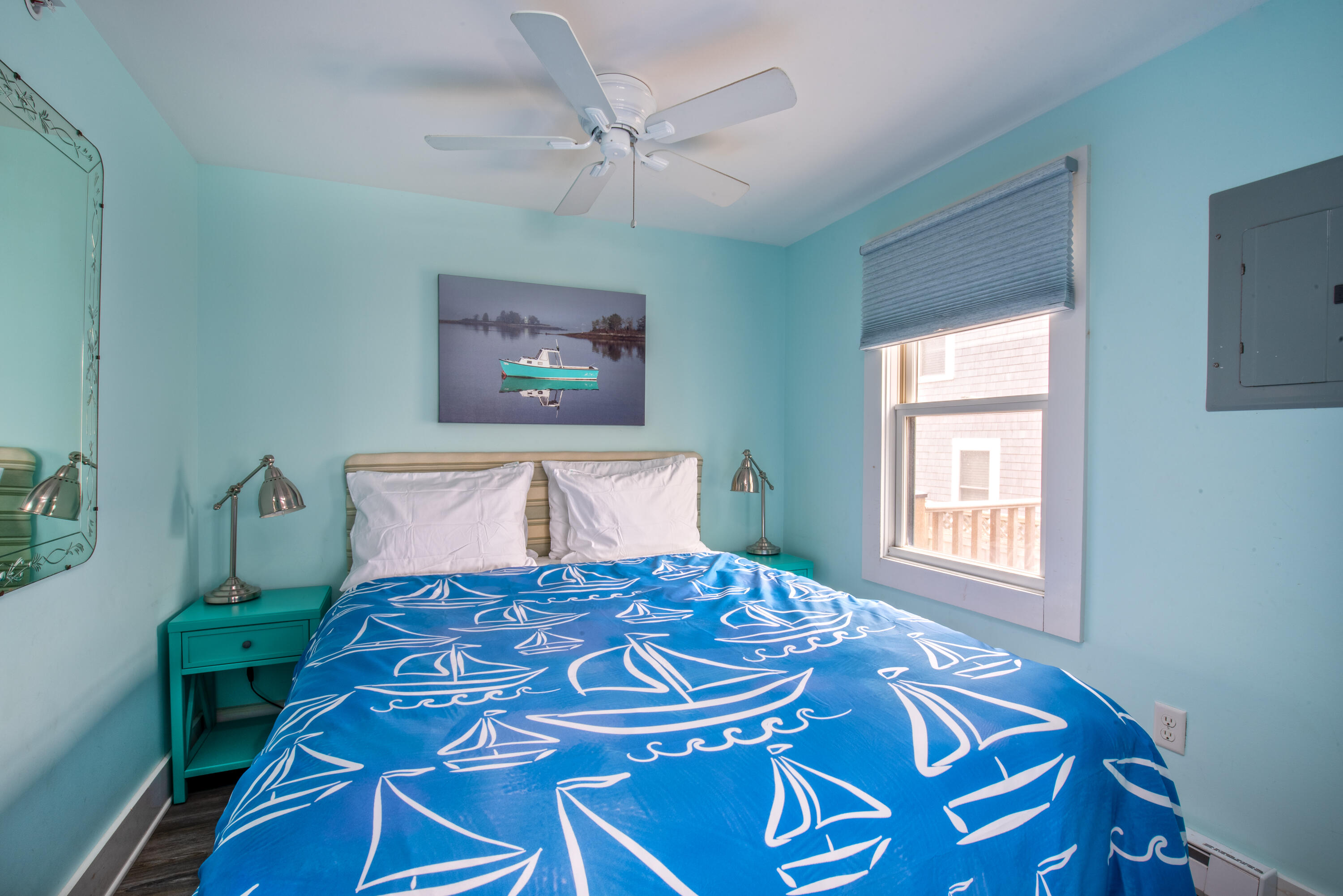 522 Shore Road, Unit 5 Truro, MA 02666 - Photo 20 of 28 a bedroom with a bed and a window